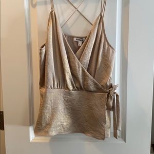 Beige/gold going out top.